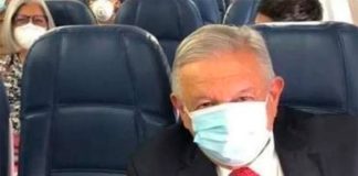 The president aboard a flight Monday to Guadalajara.