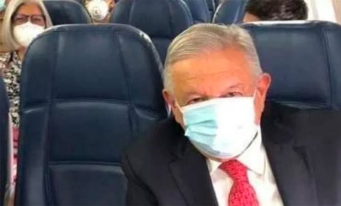 The president aboard a flight Monday to Guadalajara.