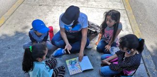 A sidewalk class in session.