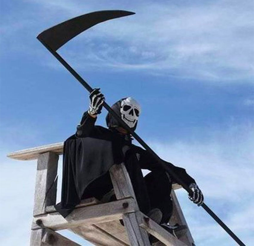 A new lifeguard watches over the beach.