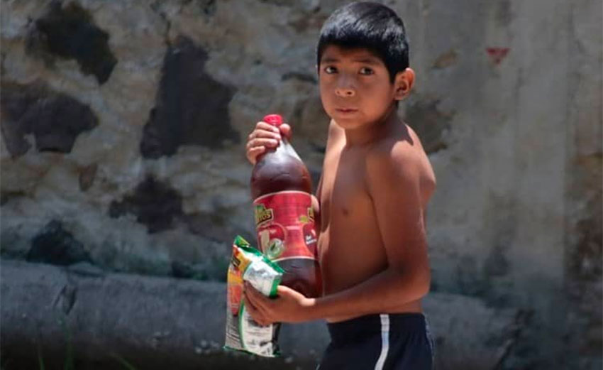 child with junk food