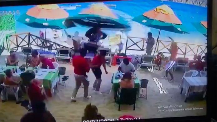 Screenshot from security camera captures the moment the personal watercraft struck a fence in front of a restaurant at El Médano beach.