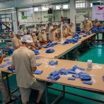 Inmates make face masks at a prison in Mexico City.