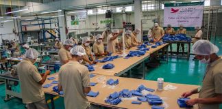 Inmates make face masks at a prison in Mexico City.