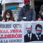 'Do you want Salinas, Peña and Calderón to go to jail?' reads the sign at a table gathering signatures for the Morena party petition.