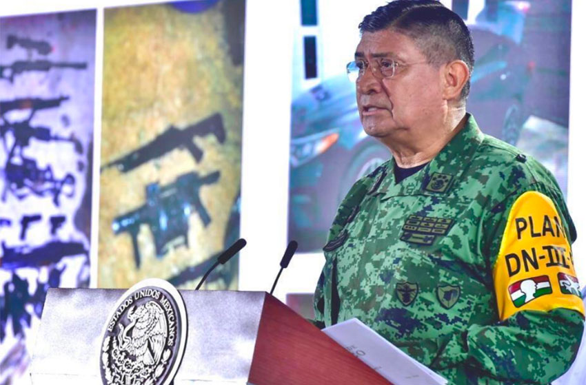 Army chief Sandoval presents a report on El Marro's arrest during Tuesday's press conference.