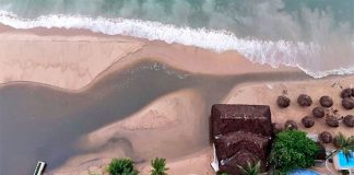 An aerial view of sewage running into the bay.