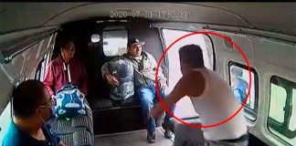 One of the two would-be thieves goes to exit the van, but didn't get very far.