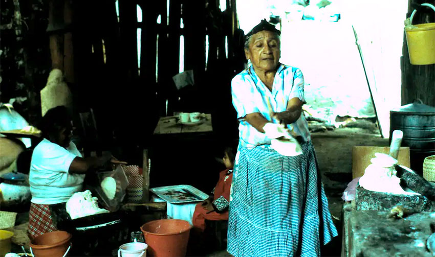 A Zapotec woman makes tamales.