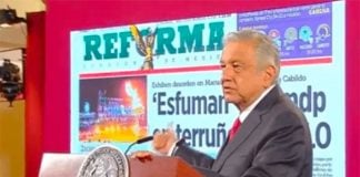 'It's a trashy publication, without ethics, professionalism or scruples,' president says of the newspaper.