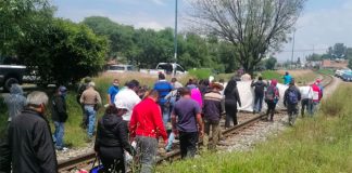 Teachers on the tracks in Michoacán.