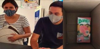 The Sears customers with their new phone and what the courier delivered.