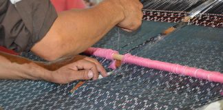 A rebozo is made on a backstrap loom at the Feria de Rebozo in Tenancingo, México state.