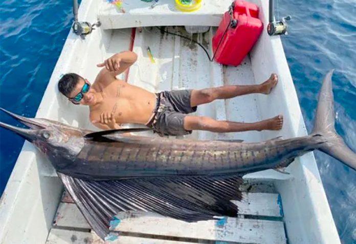 Moncada with the 56-kilo sailfish he caught last week.