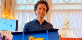 Filmmaker Franco with his award in Venice.