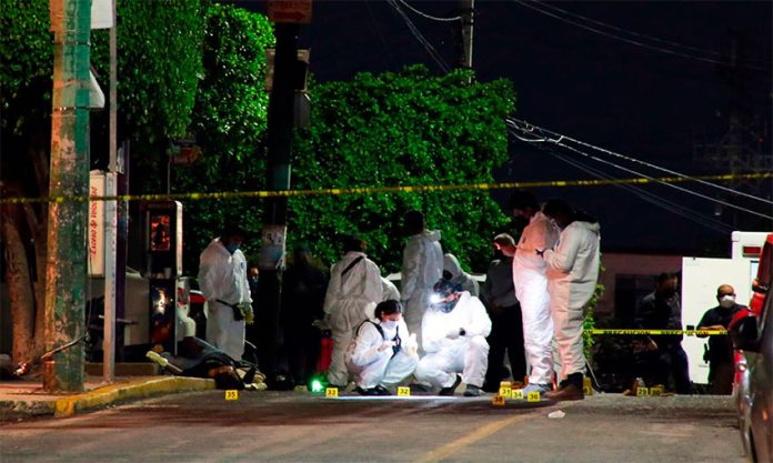 Investigators at the crime scene in Cuernavaca.