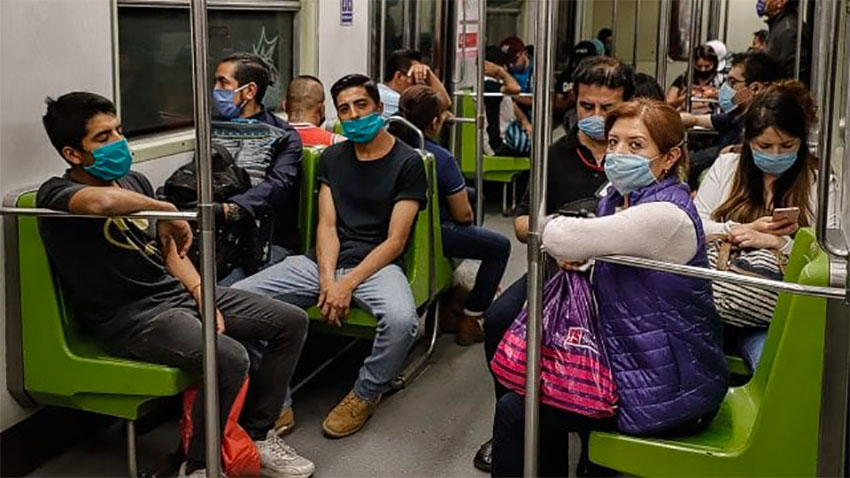 Use of face masks should be mandatory, say former health officials.