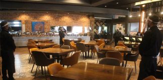 Restaurants that remain open must operate with limited capacity.