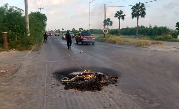 Tires burn on a road in Reynosa.