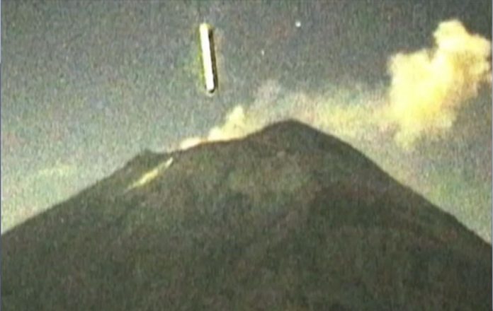 A UFO enters the crater of El Popo, the volcano in central Mexico.