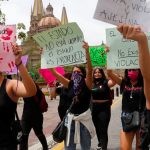 Women march in Guadalajara on Wednesday.