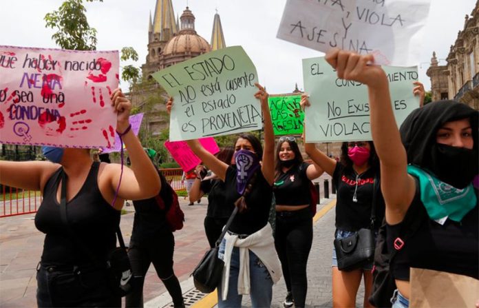 Women march in Guadalajara on Wednesday.