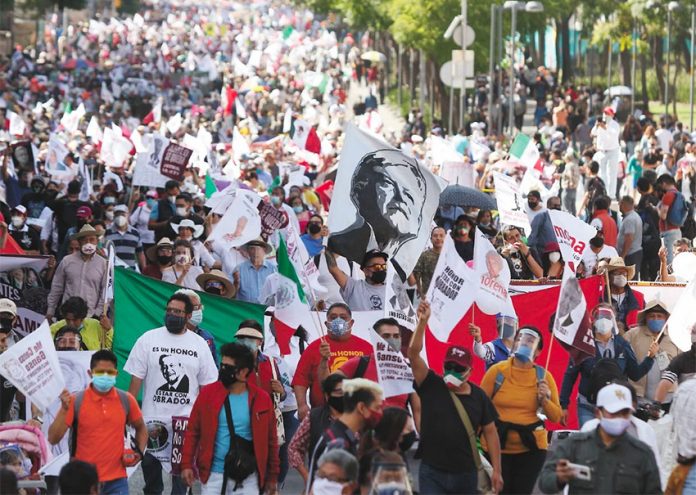 Supporters of President López Obrador march in the capital on Saturday.
