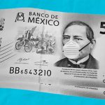 500-peso bill with face mask