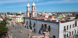 Calera, where police battled gangsters on Monday.