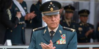 Cienfuegos was traveling with his family when he was arrested at the Los Angeles airport.