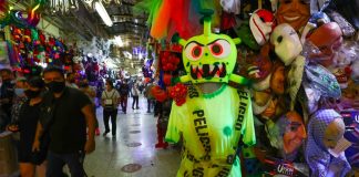 A Covid Halloween costume at the Sonora Market.