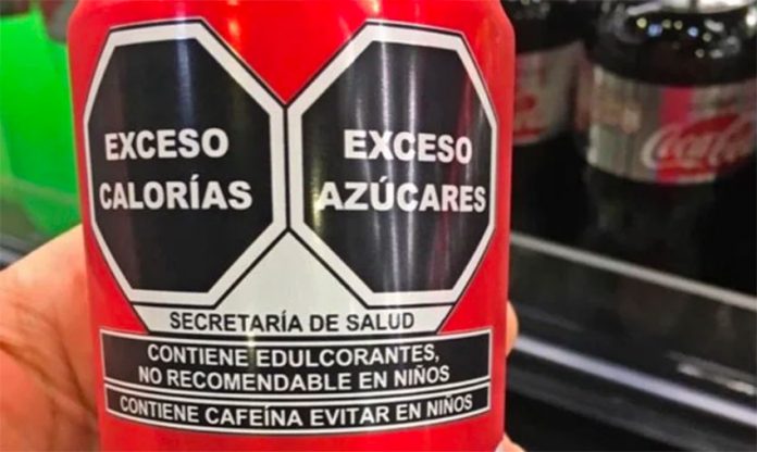 The label warns of high calories and sugar content on this drink.