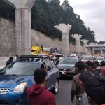Students collect tolls on the Mexico City-Toluca highway.