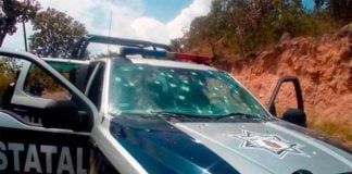 A bullet-riddled police vehicle after the attack in Durango.