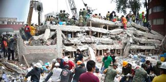 Rescue workers at the school after the 2017 earthquake.