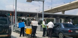 Tourism sector workers collect tolls at Tlalpan