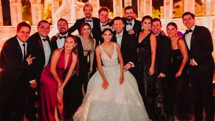 A happy wedding party in Mexicali where 100 guests were infected.