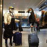 Many Americans this year are risking packed airports and potentially unsafe Thanksgiving get-togethers.