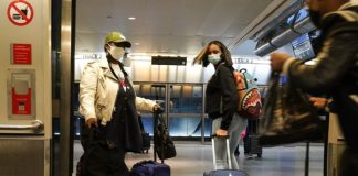 Many Americans this year are risking packed airports and potentially unsafe Thanksgiving get-togethers.