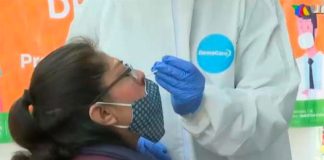 A woman is tested for Covid at a Mexico City testing station.