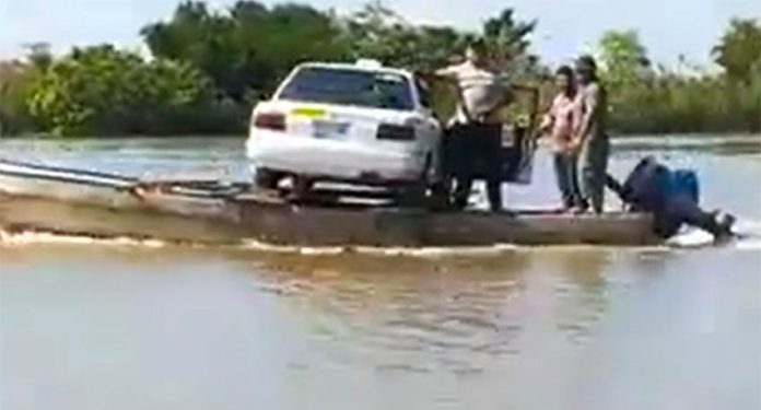 A car is ferried across the Usumacinta River in Tabasco.