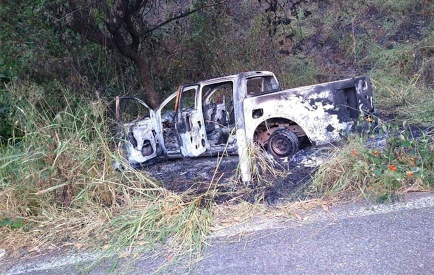 One of 11 vehicles set on fire by a Jalisco cartel cell in western Michoacán.