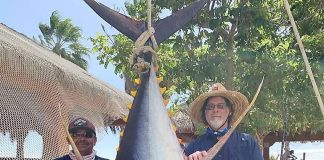 Capt. Castillo and angler Mike Witoshynsky with giant tuna.