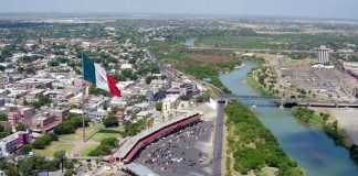 Nuevo Laredo on the left and Laredo on the right, divided by the Rio Grande river.