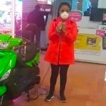 woman chained to bike