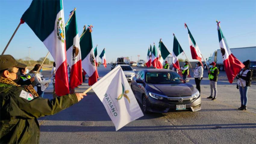 Mexicans traveling home are welcomed at the US border.