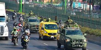 Security forces escort a shipment of Covid-19 vaccine