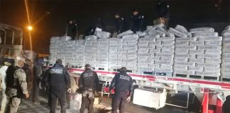 The trailer was carrying a load of plaster and drugs.