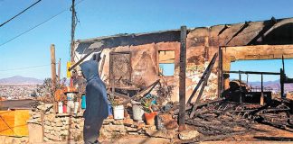 The remains of a home gutted by fire Thursday in Tijuana.