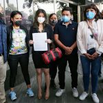 The parents outside the offices of the attorney general on Wednesday.